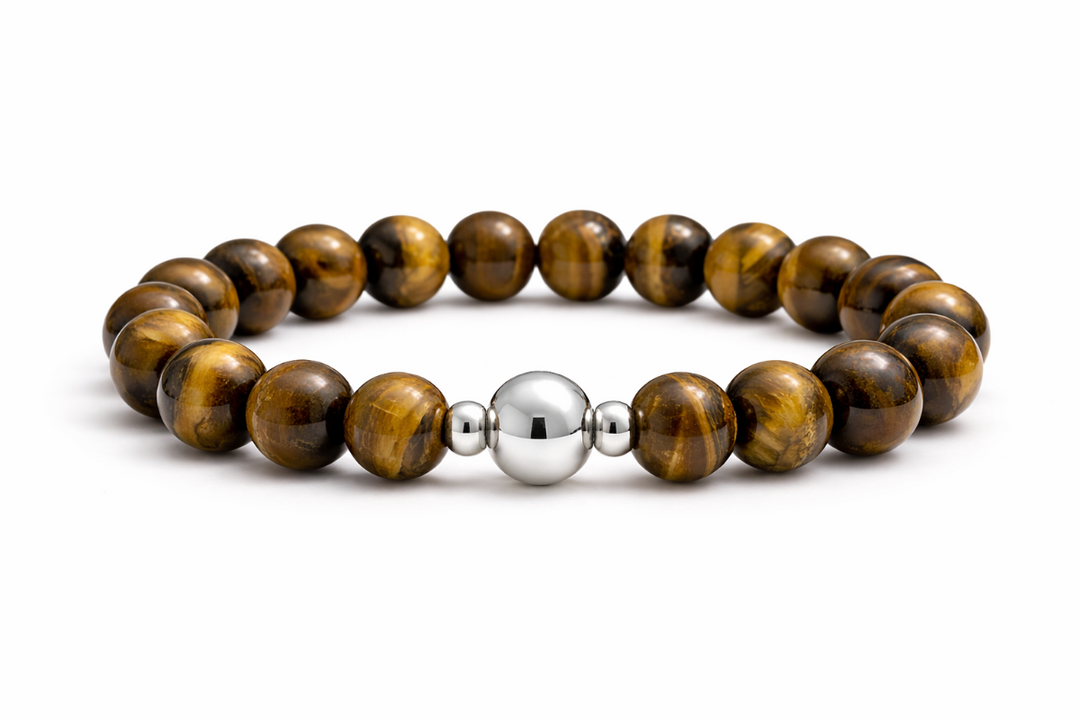 Bracelet with brown beaded design and silver bead on a white background