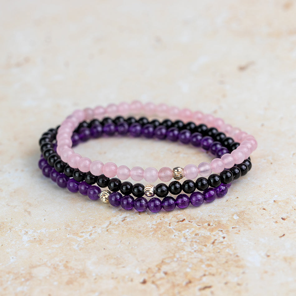Crystal healing bracelet set with gemstones rose quartz, black tourmaline and amethyst - made to measure here in the UK